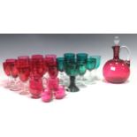 A quantity of early 20th century coloured glassware, to include various ruby glasses with clear