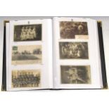 Large First World War postcard album with 295 postcards and 5 items of postal history, including