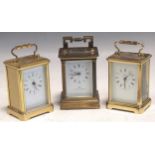 Two Asprey's gilt brass carriage clocks (one with battery quartz movement) and a Matthew Norman
