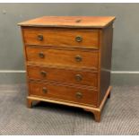 A small mahogany chest of four long drawers on bracket feet72 x 65 x 45cm