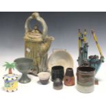 A collection of Studio Pottery, including various smaller vessels, a goblet and a large teapot, 35cm