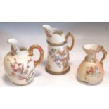 Three Worcester blush ivory jugs, decorated with blossoms and flowers, tallest 18cm high (3)