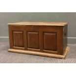 An early 18th century oak triple panelled coffer, possibly French, 57 x 115 x 58cm