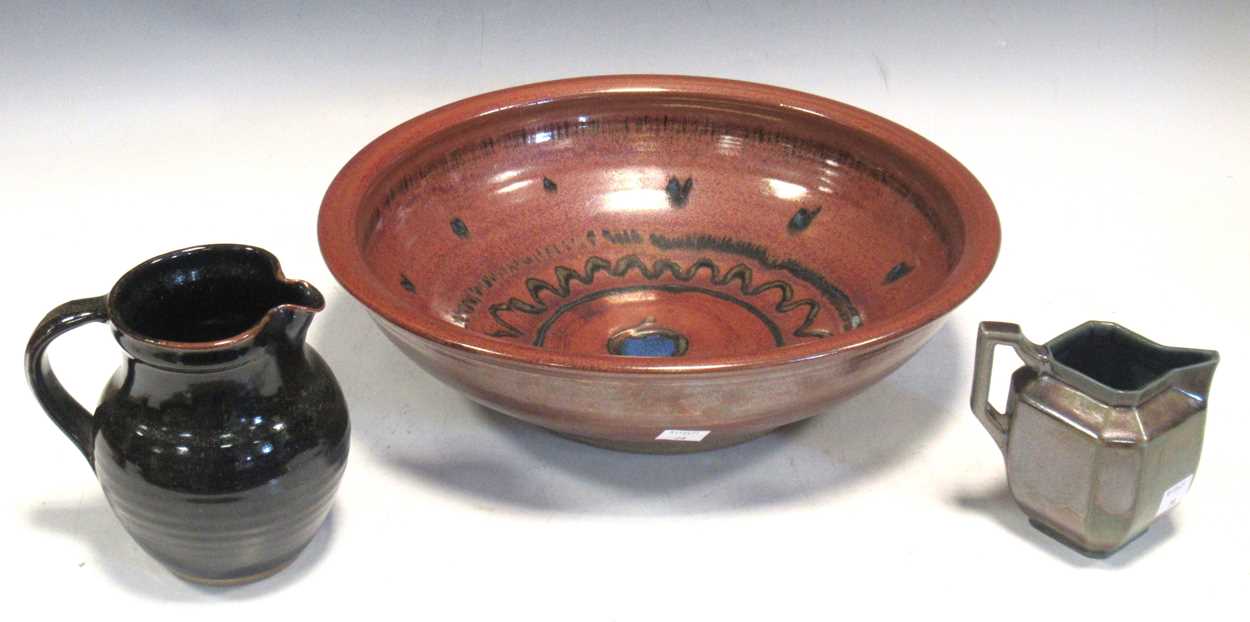 A Winchcombe Pottery dish, together with a jug and a Ray Finch (Winchcombe) metallic glaze jug (3)