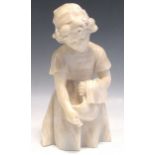 A carved alabaster figure of a young woman holding a cloth, 30cm high