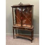 A Chippendale-style glazed cabinet on stand, early 20th century, 201.5 x 113 x 31cm