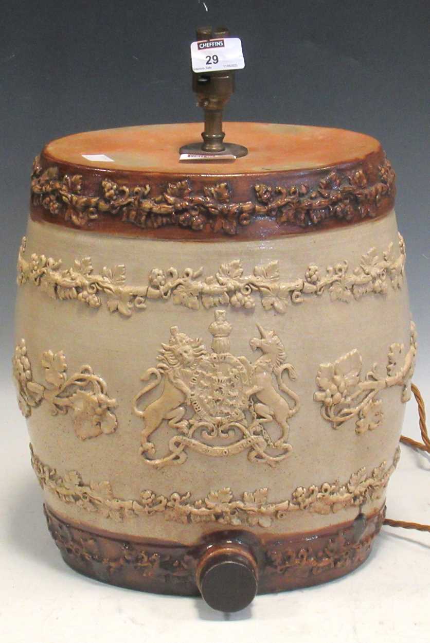 A salt-glazed spirit barrel, sprigged with the royal coat of arms (now converted to a lamp), 41cm