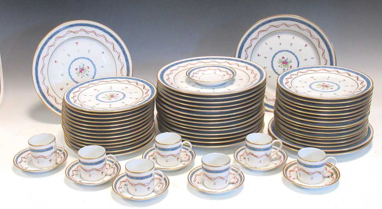 A Haviland dinner service, sold by Harrods, including teacups, saucers and platesProvenance: