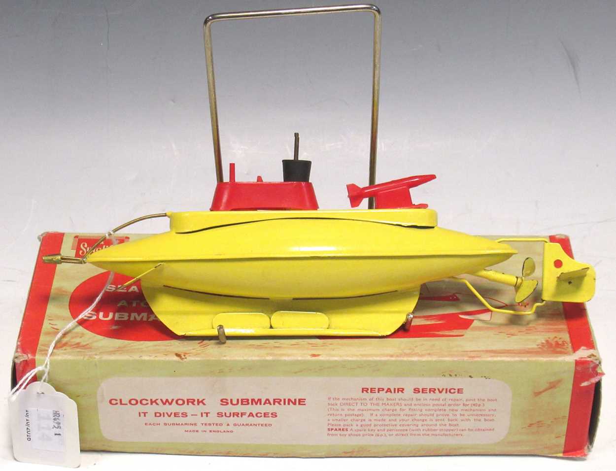 A Sutcliffe model of a yellow submarine, with original box, 25cm long