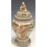 A Japanese earthenware jar and cover, late Meiji Period, 30cm high