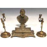 A pair of brass figural candlesticks, a brass bust of Pope Pius IX,20cm high, and a brass inkwell (