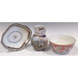 A Worcester Queen Charlotte pattern slop bowl; a Derby lozenge shape stand, circa 1795 and a Chelsea