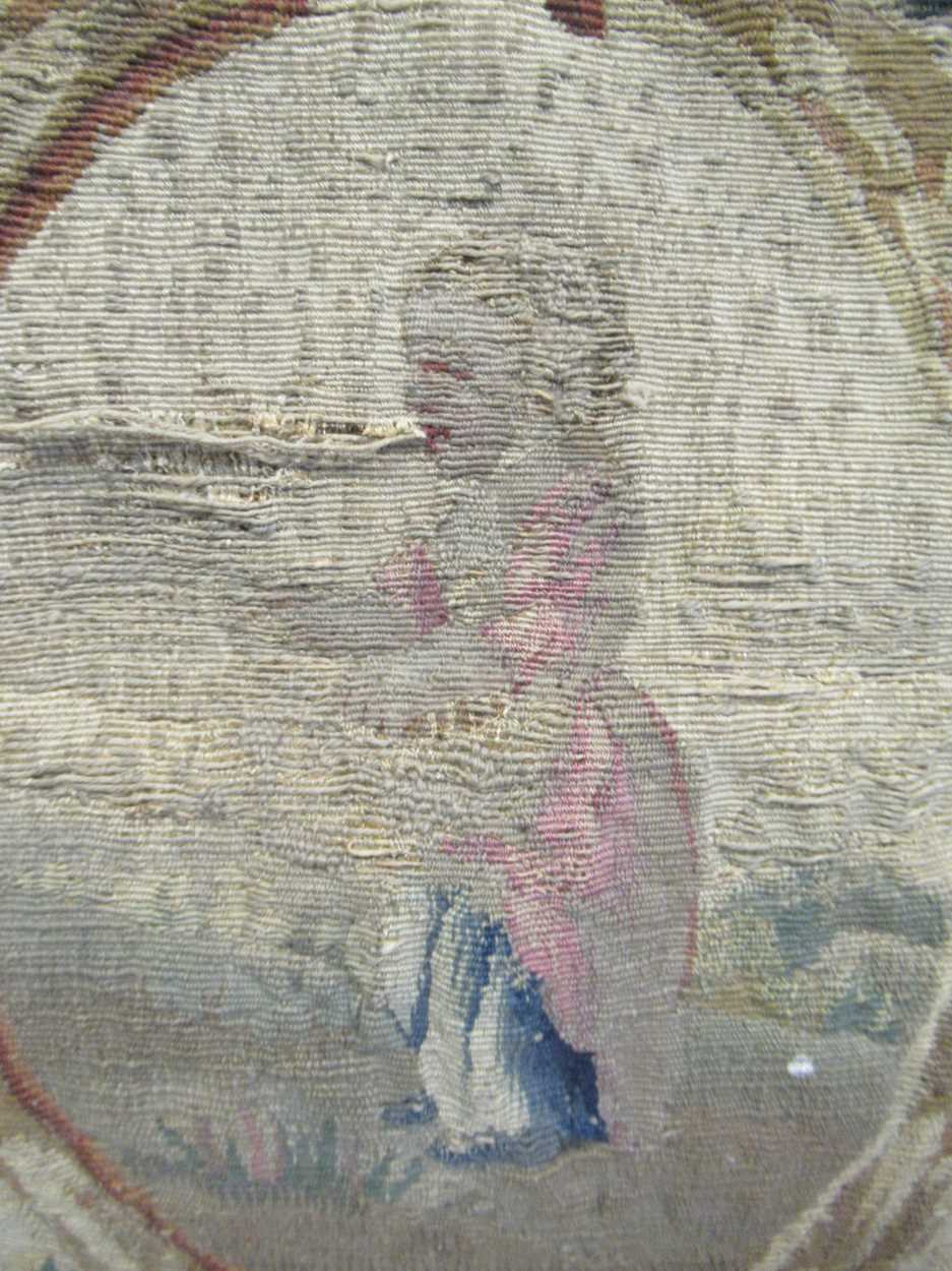 An 18th century Aubusson needlework applied to a later cushion, decorated with a young girl within a - Image 4 of 4