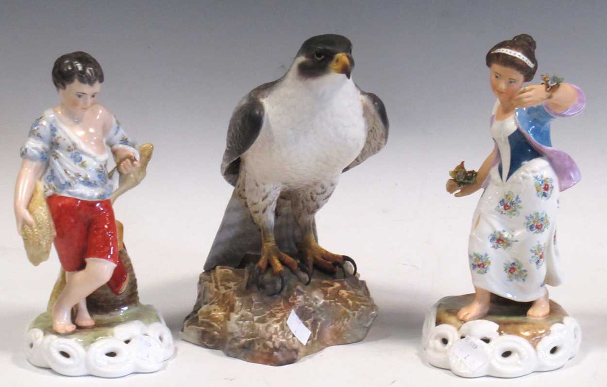 A large Royal Crown Derby model of a falcon 24cm high, together with a pair of Royal Crown Derby