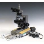 Olympus Polarize light trinocular microscope c.1978, with phase contrast with parts, reflectants