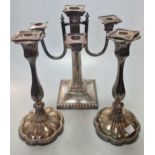 A silver plated five light candelabra together with a pair of silver plated candlesticks