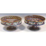 Two tazzas by Alfredo Santerelli, decorated with foliate motifs with central roundels depicting a