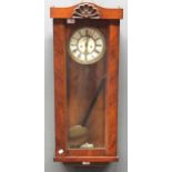 A 19th century walnut case Vienna type wall clock with twin weight movement, 97cm high