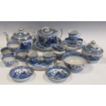 A collection of Newhall blue and white 'Two Moth' pattern teawares, comprising a teapot, cover and