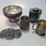 Two silver christening cups and an unmarked tea caddy, tests as silver, 18.7ozt gross, together with