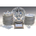 A Meissen onion pattern part dinner service, comprising: twenty-two dinner plates ten soup plates