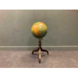 A 19th century brass line inlaid globe stand with later globe, 97cm high