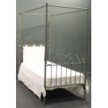 An early 20th century cast metal four poster single bed, 200 x 198 x 95cm