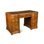 Attributed to Heal's, an Art Deco oak kneehole desk,