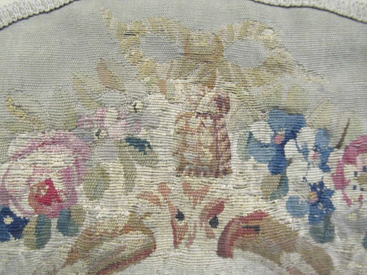An 18th century Aubusson needlework applied to a later cushion, decorated with a young girl within a - Image 3 of 4