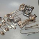 Some assorted silver flatware, 24.2ozt together with a silver plated ladle, a ladle, tests as