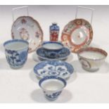 An 18th century Chinese export saucer and associated saucer; a Chinese blue and white beaker, tea