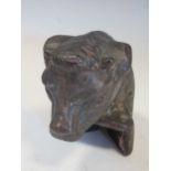 A 19th century iron model of a bull, possibly from a farmyard water pump, 15cm high