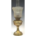 A Victorian brass gas light with chimney and shade, 59cm high