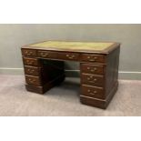 An Edwardian oak pedestal desk, 74 x 136 x 72cm