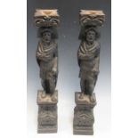 A pair of carved oak terms/ caryatids, 19th century, depicted as soldiers52cm high