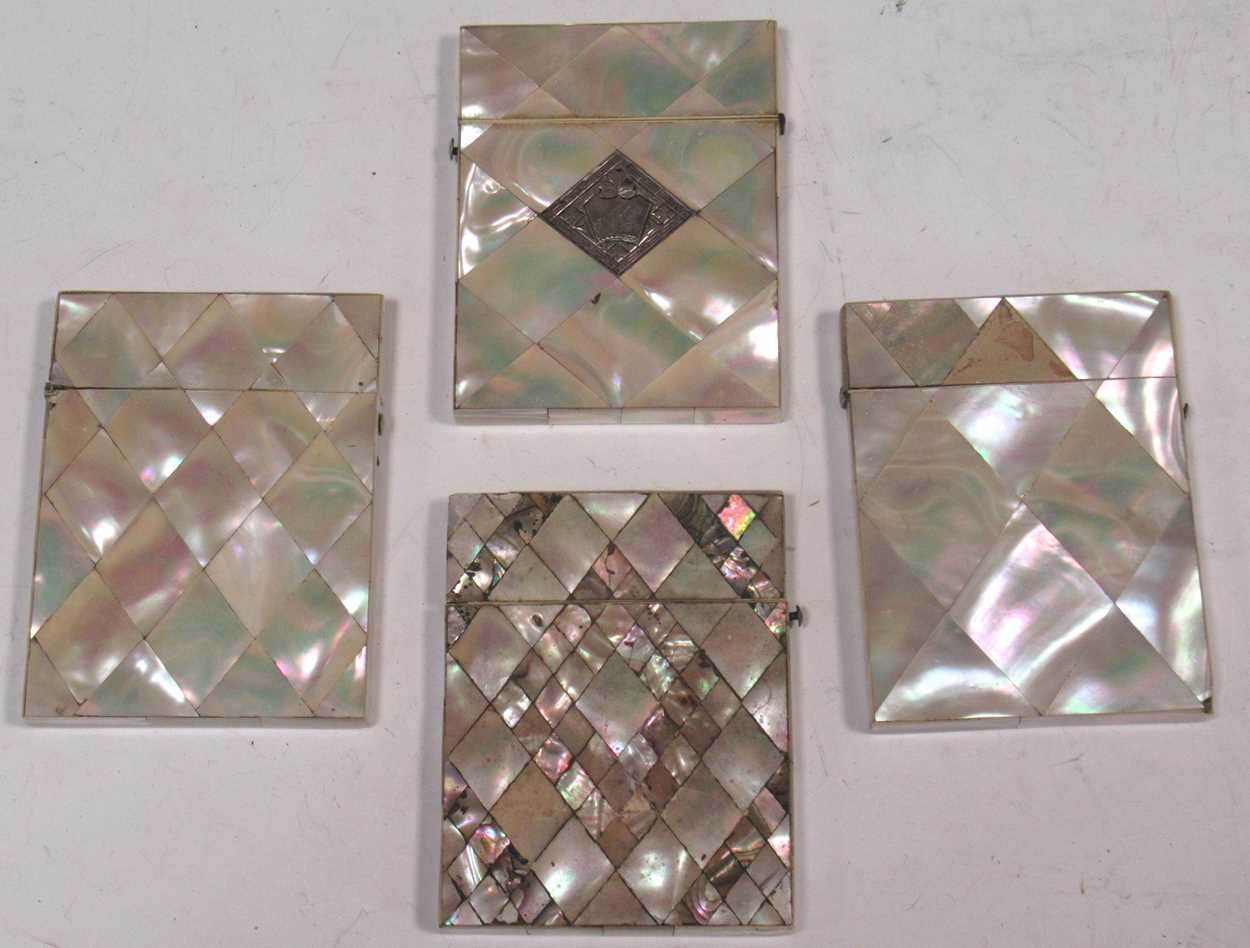 Four 19th century mother-of-pearl card cases