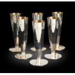 § A set of six Elizabeth II silver champagne flutes by Gerald Benney CBE (1930-2008),