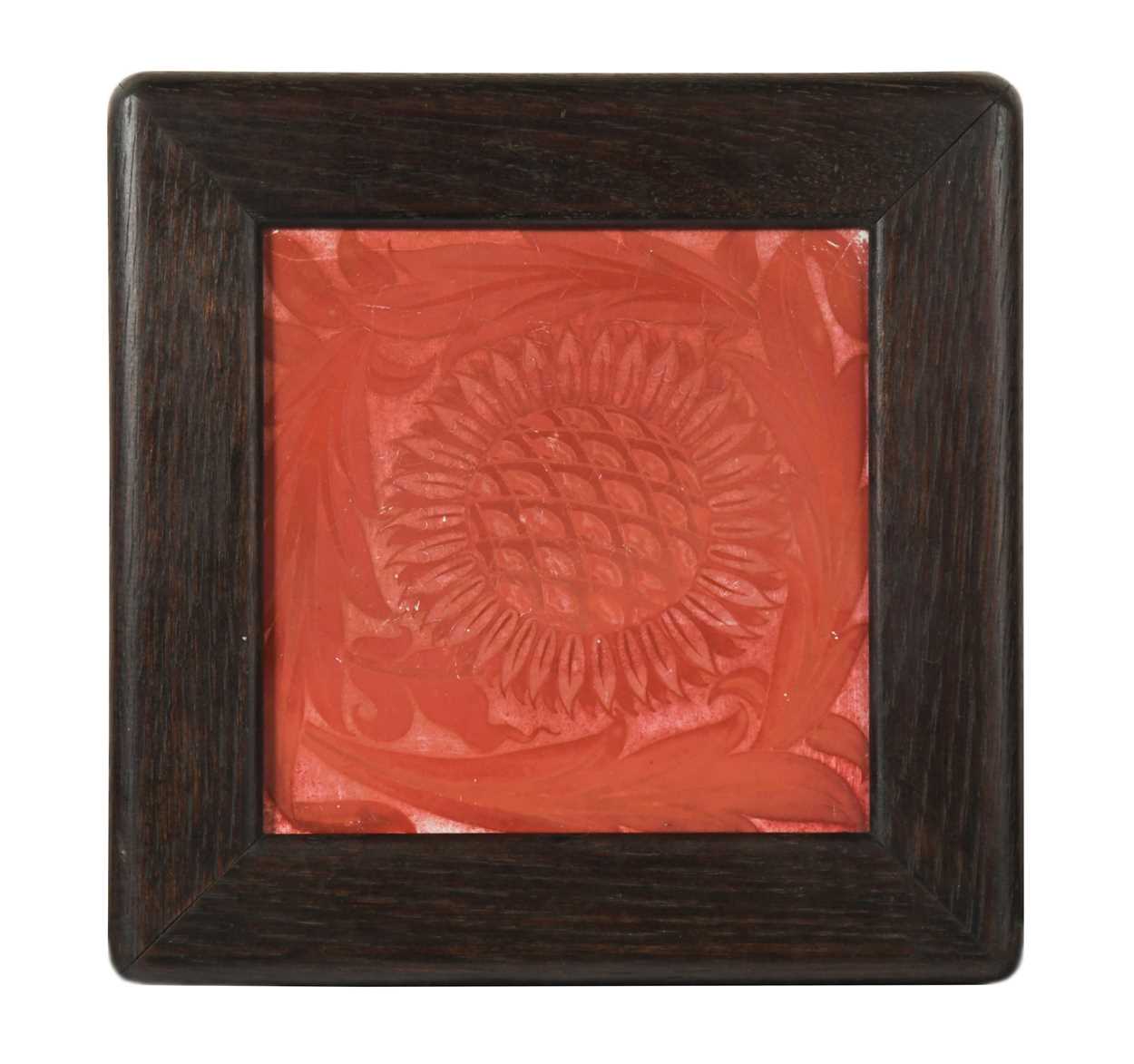 William De Morgan at Sands End, a framed ruby lustre tile,