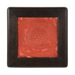 William De Morgan at Sands End, a framed ruby lustre tile,