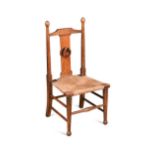 An Arts and Crafts oak 'nursery-rhyme' chair by Liberty,