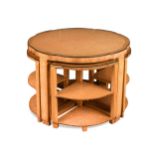 An Art Deco birds eye maple nest of tables, in the manner of Epstein,