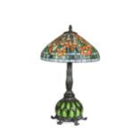 A Tiffany style leaded glass and bronze table lamp,