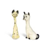 Two early 20th century earthenware model cats in the manner of Louis Wain,