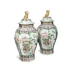 A large pair of Chinese porcelain famille rose octagonal vases and covers,