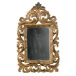 An Italian carved and gilded wood acanthus leaf small wall mirror, 18th century,