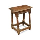 A carved oak joint stool, 17th century and later,
