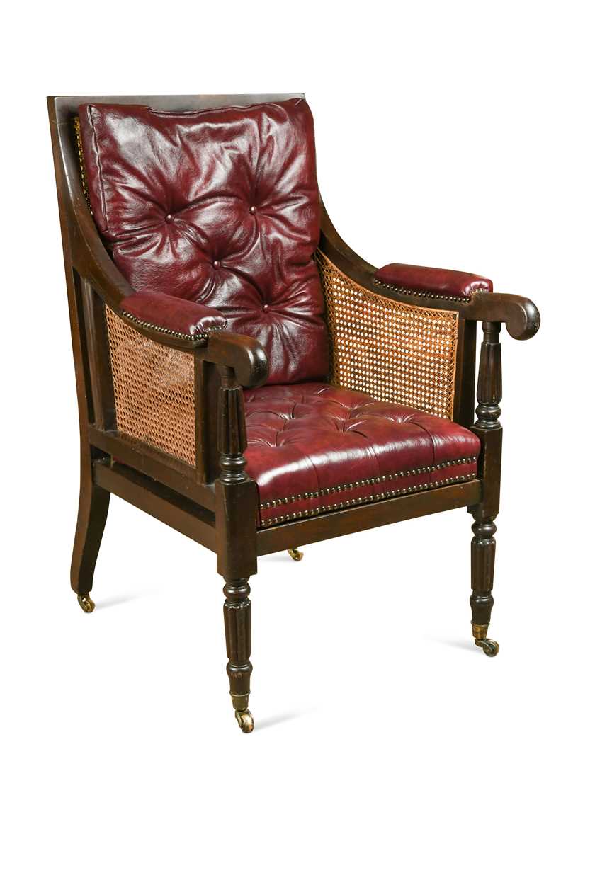 A caned mahogany bergère library armchair, 19th century,