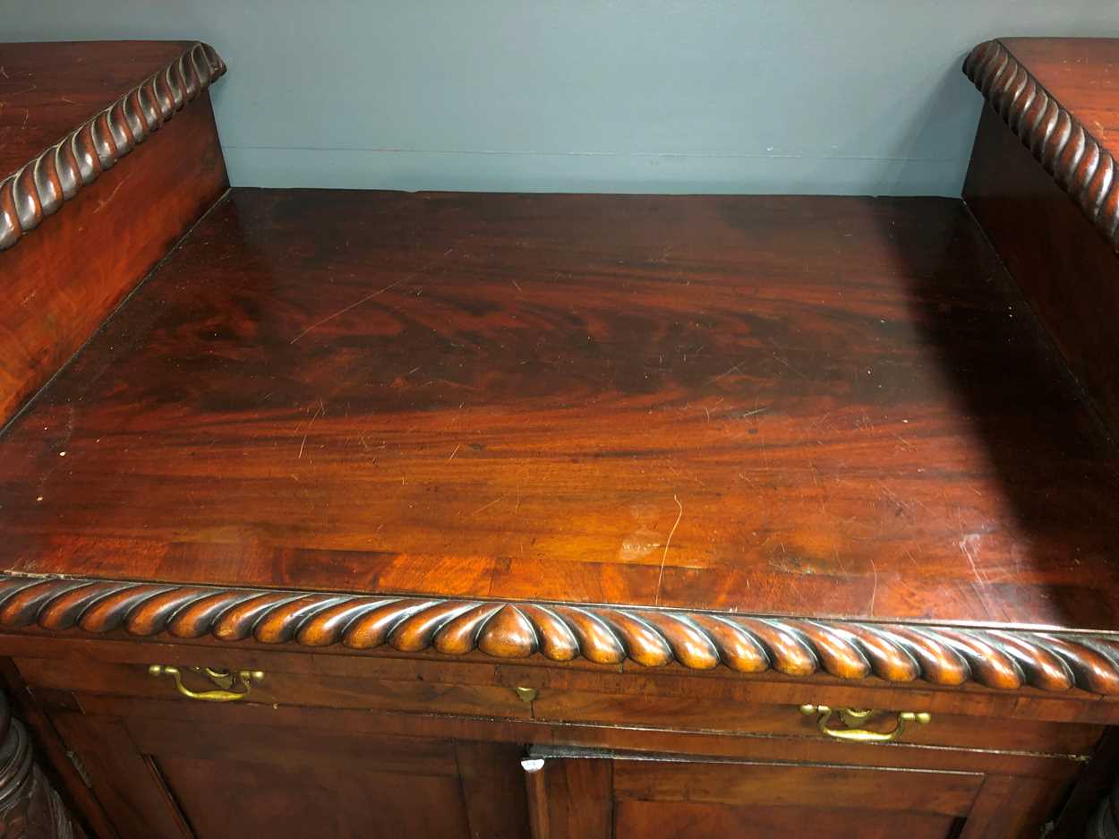 A Georgian Neo-classical mahogany carved sideboard attributed to Duncan Phyfe, New York circa 1820, - Image 3 of 9