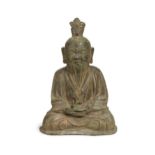 A Chinese bronze seated figure of a meditating Daoist Immortal, perhaps Laozi, 18th century,