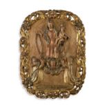 A carved, gilded and polychrome panel of the Madonna and Child, 19th century,